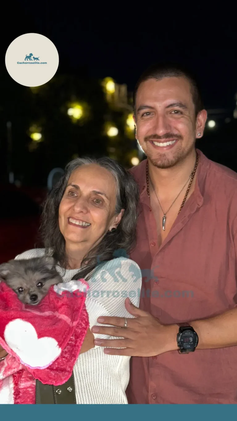 Hombre y mujer feliz con cachorro – Cachorros Élite